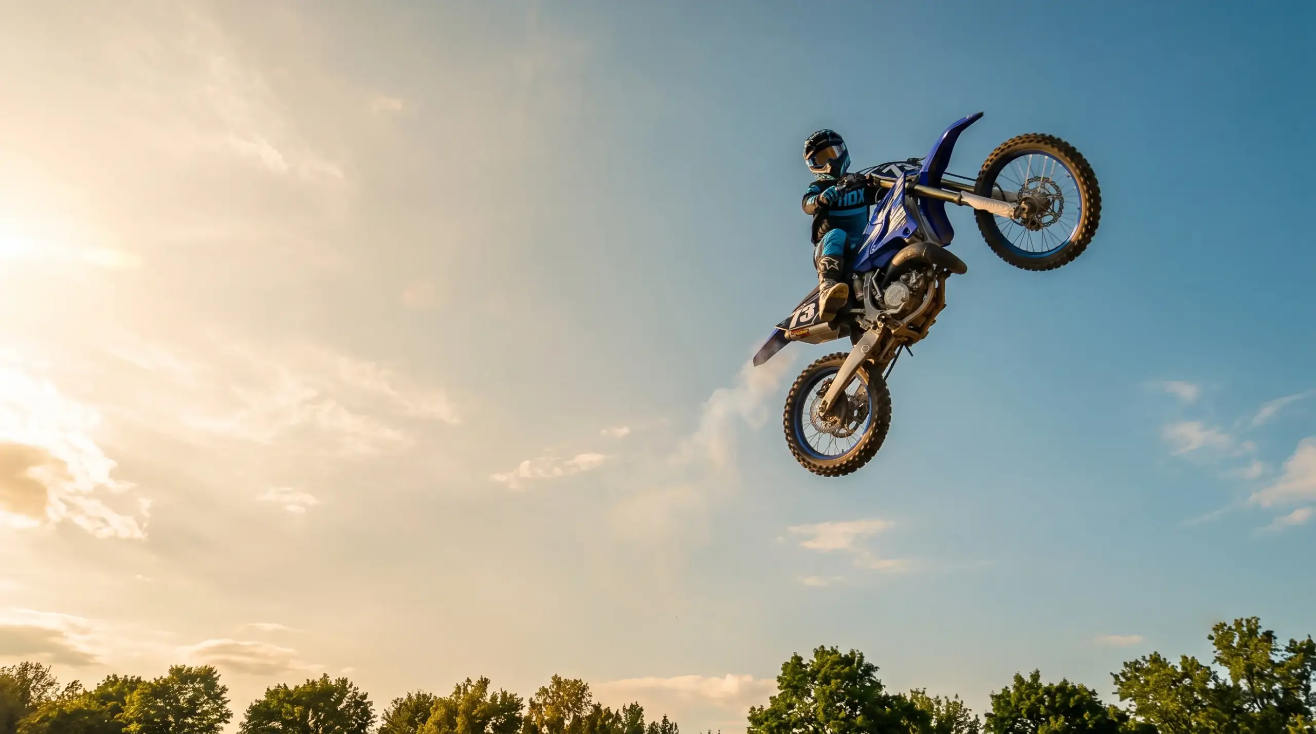 Motocross rider launching off a jump at MPA Motocross Academy